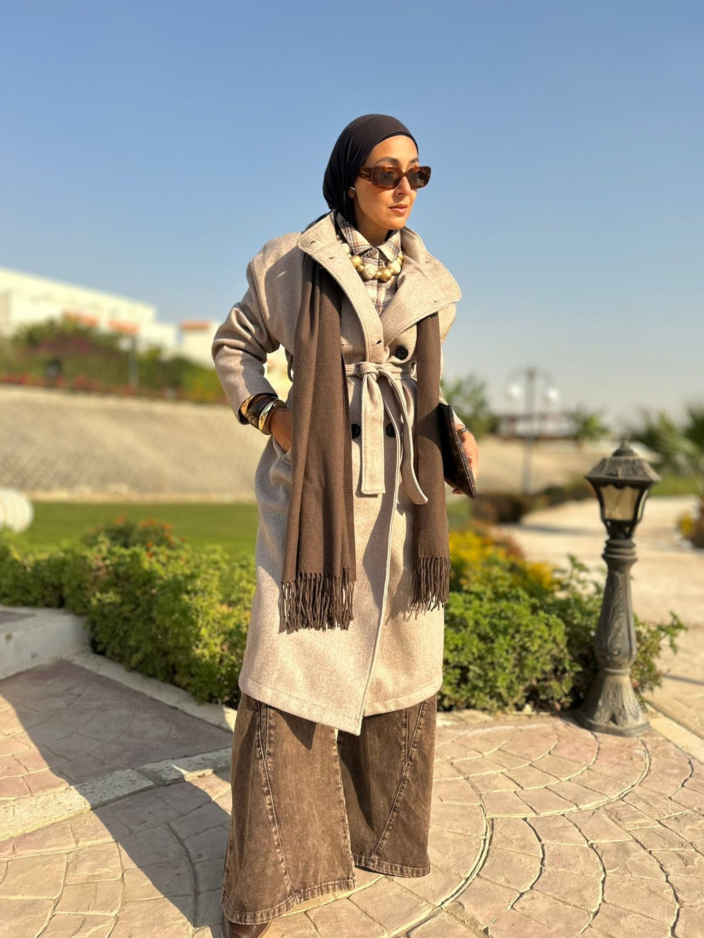 Soft wool coat in cafe