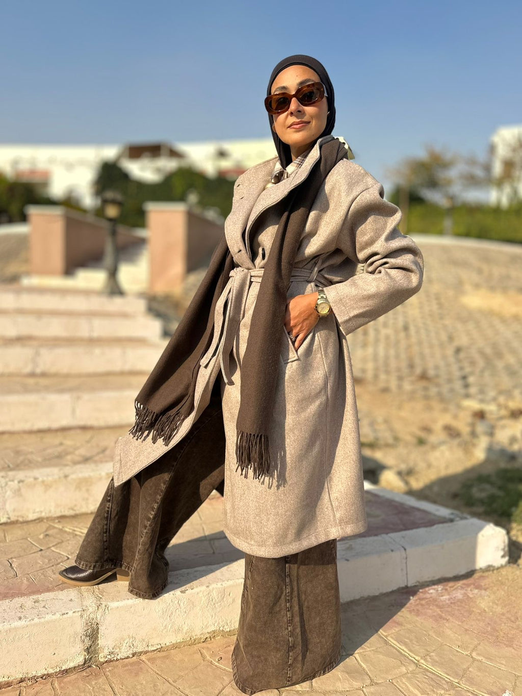 Soft wool coat in cafe